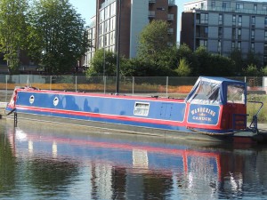 the new pram cover on Wandering Canuck, moored in the New Islington Marina, Manchester.