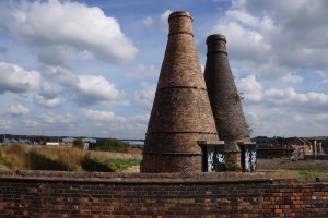 two forelorn bottle kilns, with all of the remaining factory buildings gone, alonf the Caldon Canal