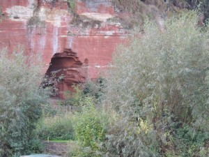 red sandstone cliffs and excavations along the Severn River
